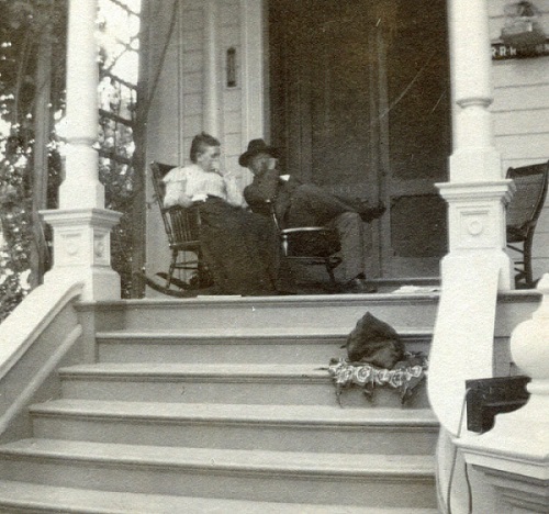 John and Emma Hammond relaxing on front porch